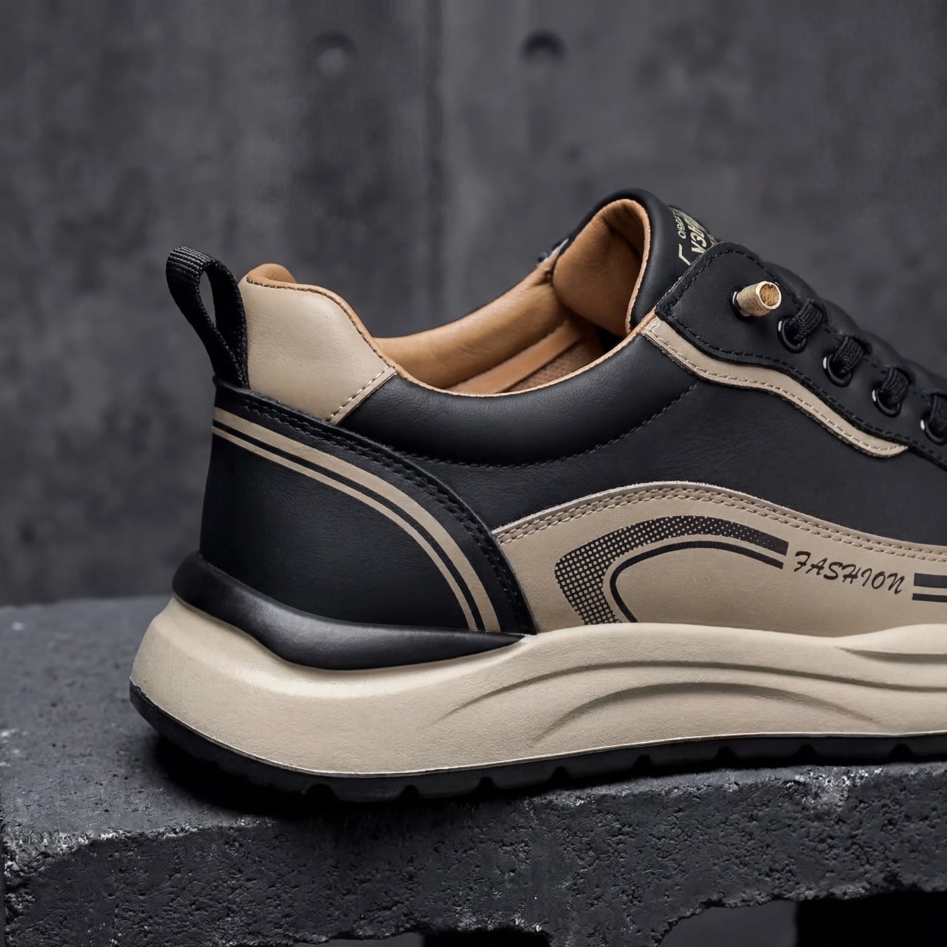 Vexor men's shock absorbing sneakers in black microfiber leather, close-up side view showing the reinforced beige heel counter and thick EVA sole.