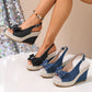 Three pairs of Vykos women's wedge espadrille sandals featuring a denim-like PU upper, open toe, bow embellishment with crystal accents, and a jute-wrapped wedge heel. One pair is shown on a model's foot from a three-quarter angle.