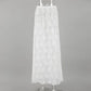 Elegant white floral lace A-line maxi skirt, displayed flat on a studio background. Features intricate floral patterns and a flowing silhouette from a high waist.