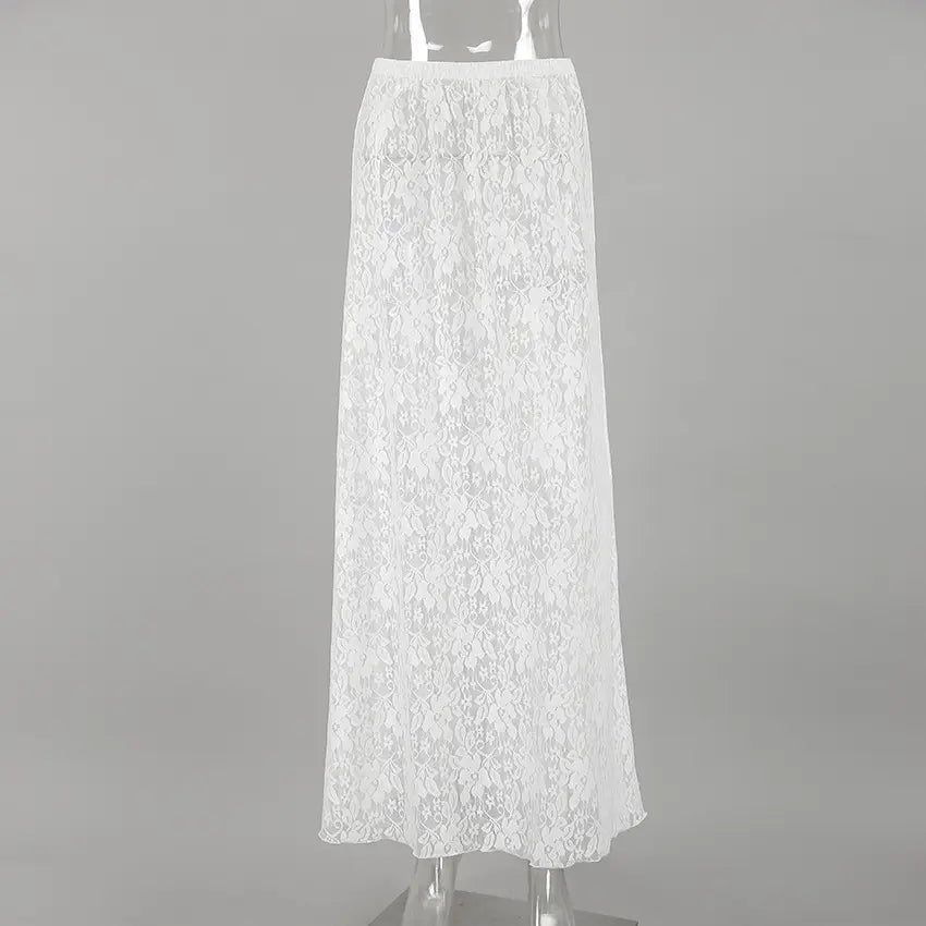 Elegant white floral lace A-line maxi skirt, displayed flat on a studio background. Features intricate floral patterns and a flowing silhouette from a high waist.