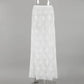 Full front view of an elegant white floral lace A-line maxi skirt, showcasing its floor-length, high-waisted, and sheer design with a natural lace hem.