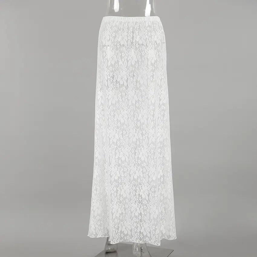 Full front view of an elegant white floral lace A-line maxi skirt, showcasing its floor-length, high-waisted, and sheer design with a natural lace hem.