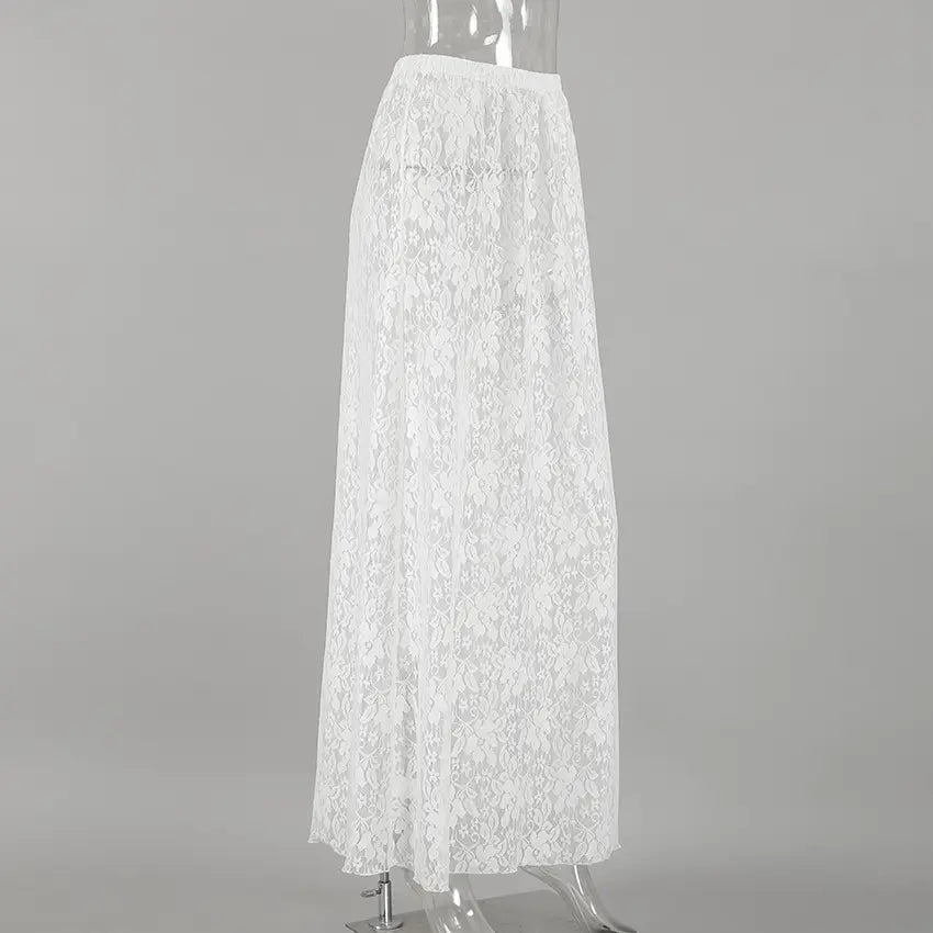 Side view of a floor-length white floral lace A-line maxi skirt, featuring a high waist, sheer fabric, and a natural lace hem.