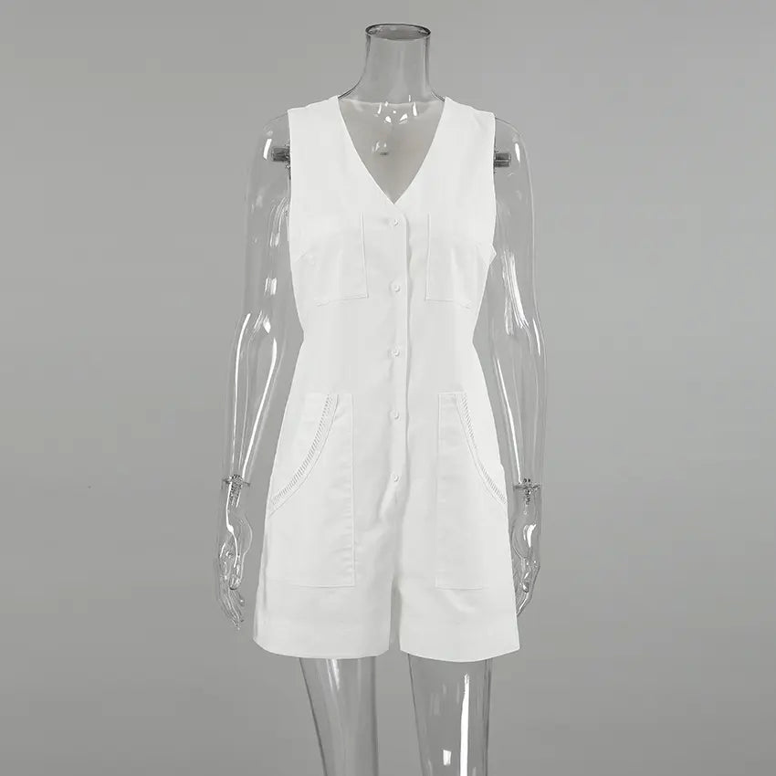 White sleeveless V-neck linen-blend romper with a button-down front, dual chest pockets, and decorative stitching on hip pockets, presented on a mannequin.