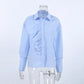 Jorvik women's powder blue collared long-sleeved blouse featuring an asymmetrical front ruffle detail, presented on a mannequin.