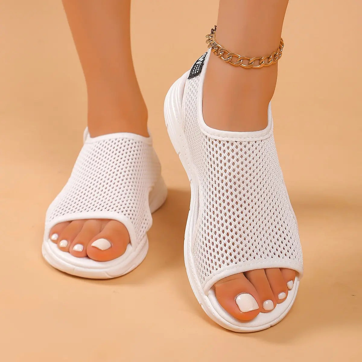 White breathable mesh women's platform sandals with a peep-toe design and comfortable elastic heel strap, shown on feet with a gold anklet.