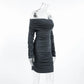Side view of a charcoal grey Zavala off-the-shoulder mini dress featuring long ruched sleeves and all-over asymmetrical ruching for a sculpted bodycon silhouette.