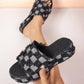 Zevon women's platform slide sandals featuring a distressed denim checkerboard pattern with frayed edges, shown in a three-quarter view with a foot partially visible.
