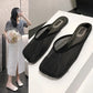 Zoria black mesh mules with square toe and flat sole shown from a three-quarter angle, paired with a lifestyle shot of a woman wearing white mules.