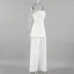 Side view of the Zyra linen set featuring an ivory strapless bandeau top and flowing wide-leg pants displayed on a mannequin.