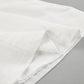 Close-up view of the luxurious off-white 100% linen fabric from the Zyra Linen Set, highlighting its natural texture and artisanal stitching details.
